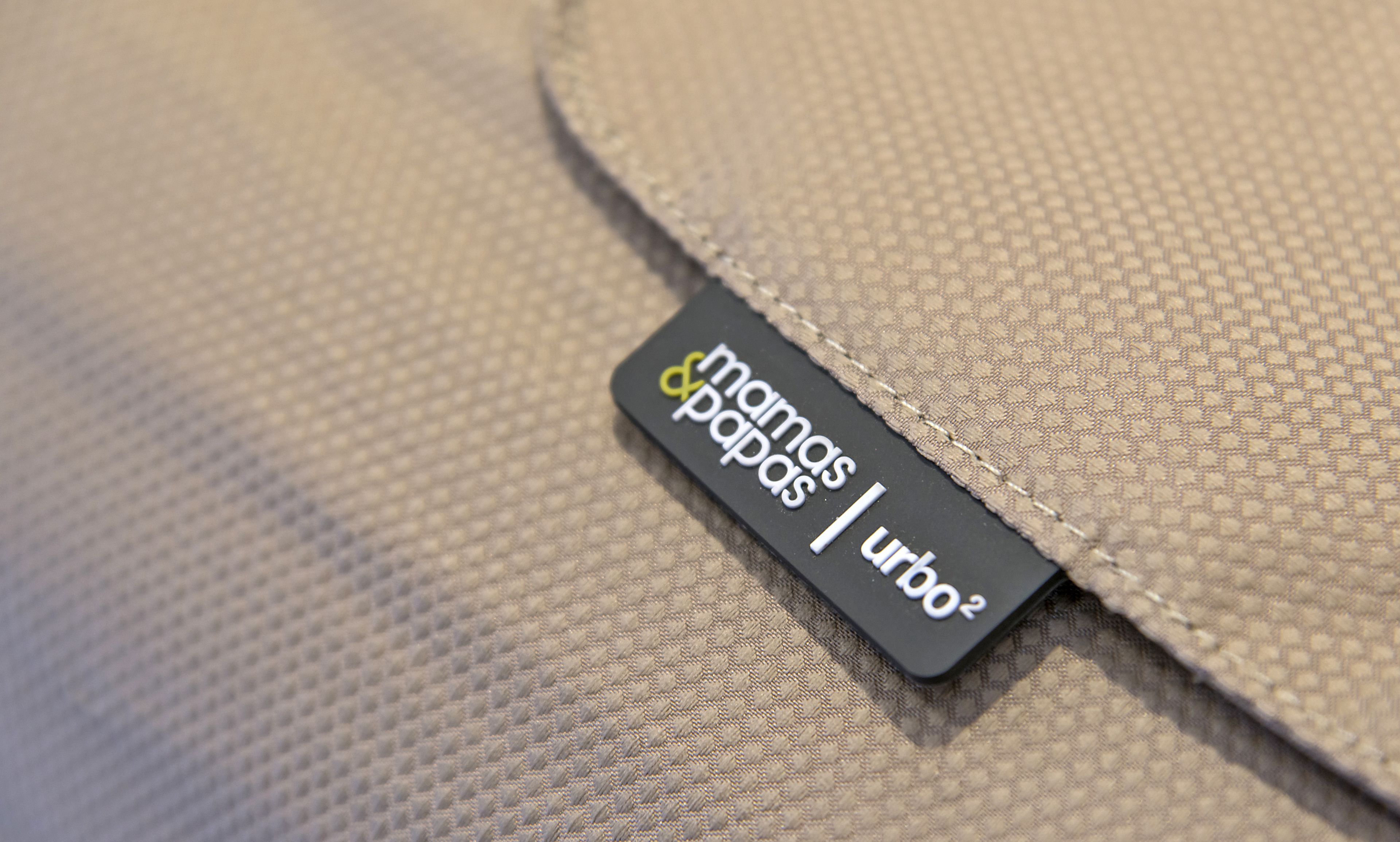 A fabric with a label reading "mamas papas Urbo".