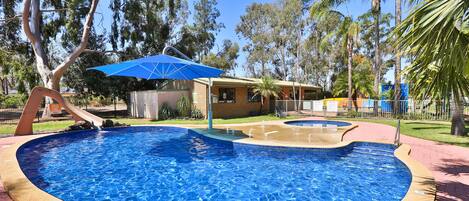 Outdoor pool, a heated pool, sun loungers