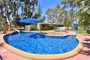 Outdoor pool, a heated pool, sun loungers