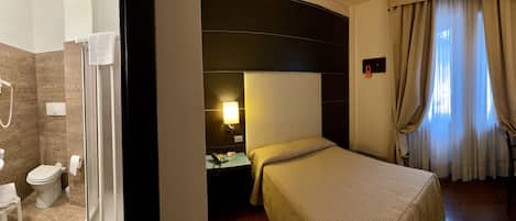 Economy Room, 1 Large Twin Bed | Hypo-allergenic bedding, minibar, in-room safe, desk