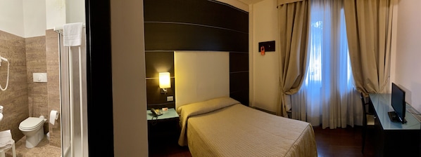 Habitación económica, 1 cama individual grande | Ropa de cama hipoalergénica y minibar