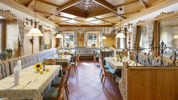 Breakfast, lunch, dinner served; local cuisine, garden views