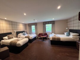 Large Family Room | Individually decorated, desk, iron/ironing board, rollaway beds