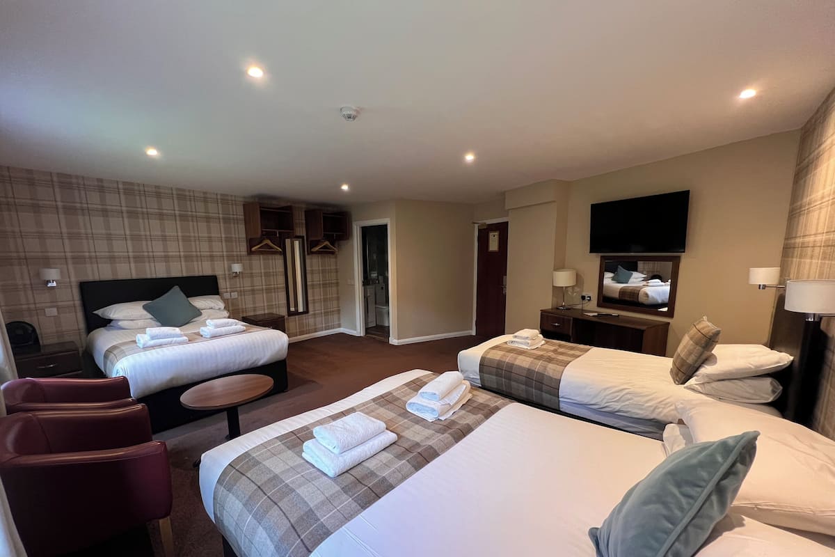 Large Family Room | Individually decorated, desk, iron/ironing board, rollaway beds