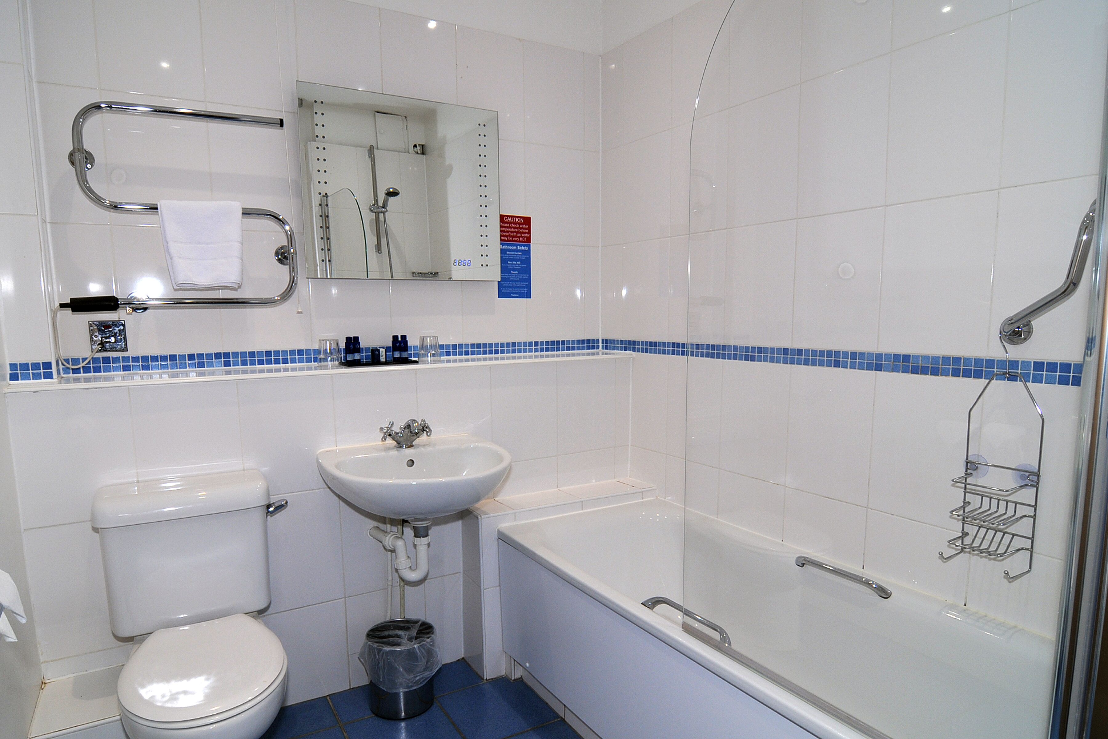 combined shower/bathtub, free toiletries, hair dryer, towels