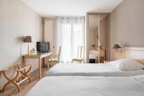 Klassieke Twin kamer | Een minibar, een kluis op de kamer, individueel gedecoreerd