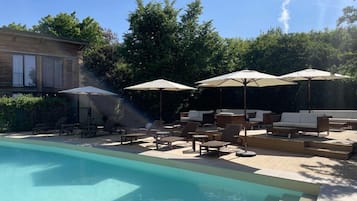 Seasonal outdoor pool, pool umbrellas, sun loungers