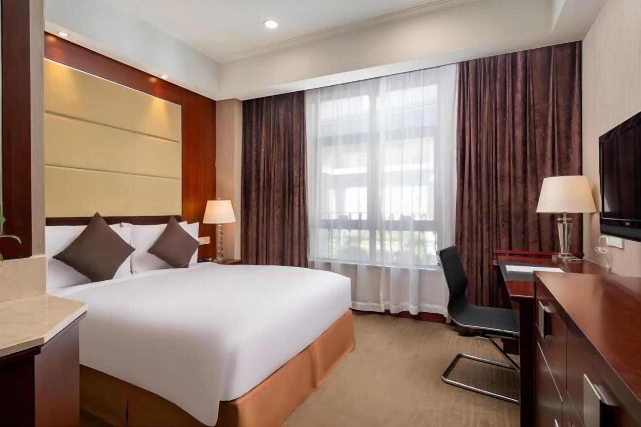 Edredón, caja de seguridad en la habitación, wifi gratis y ropa de cama 