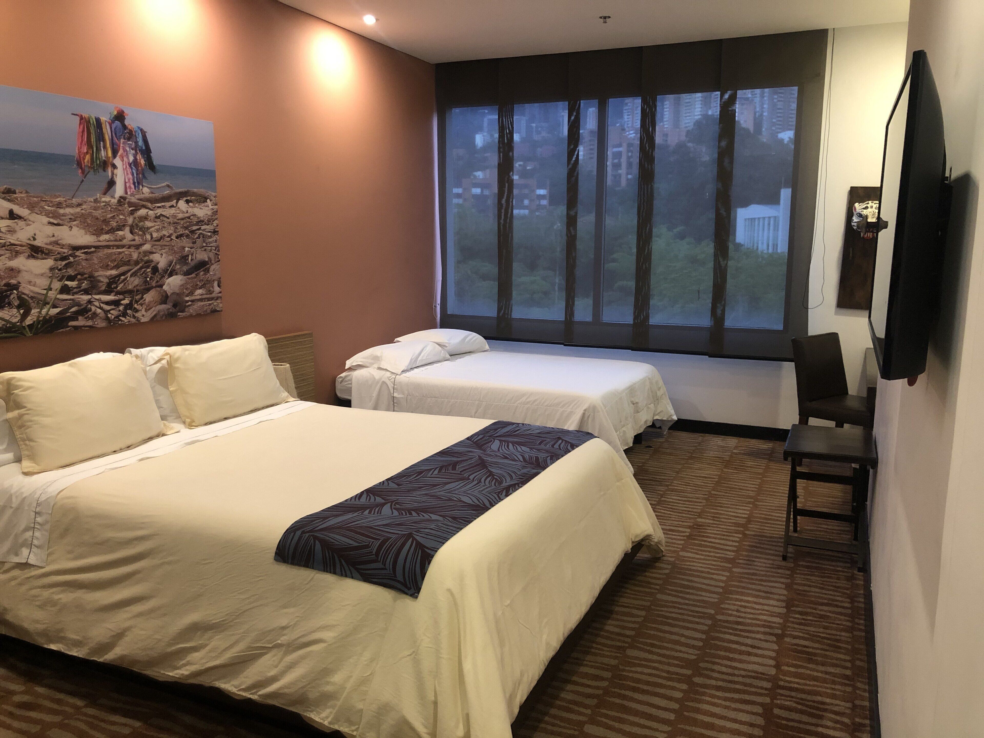 family room | 1 bedroom, down duvets, pillow-top beds, minibar