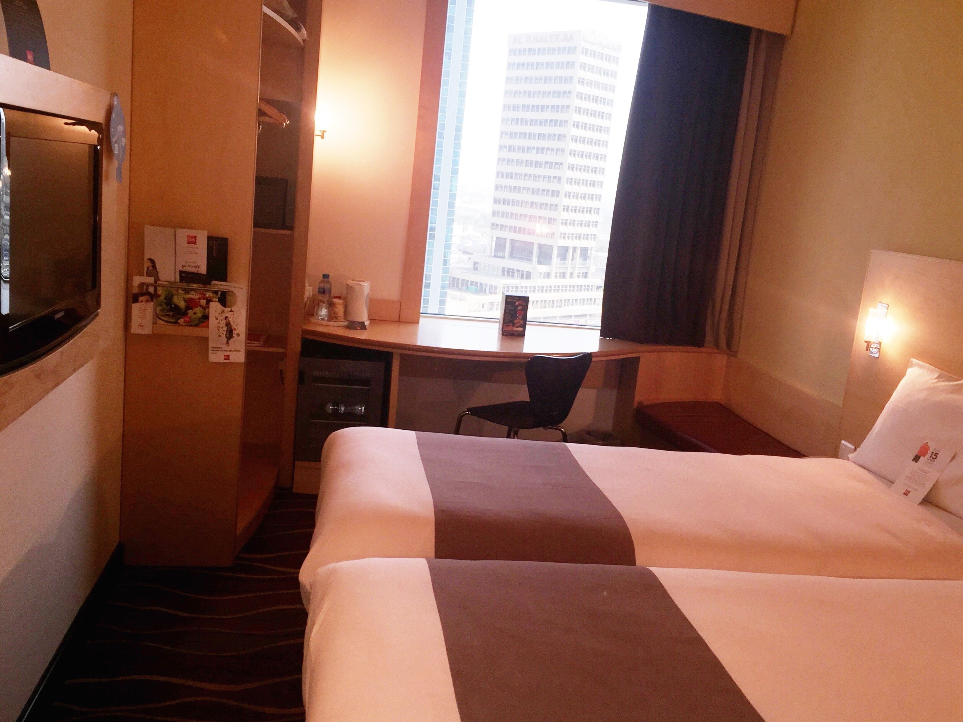 standard room, 2 single beds | in-room safe, desk, soundproofing, iron/ironing board