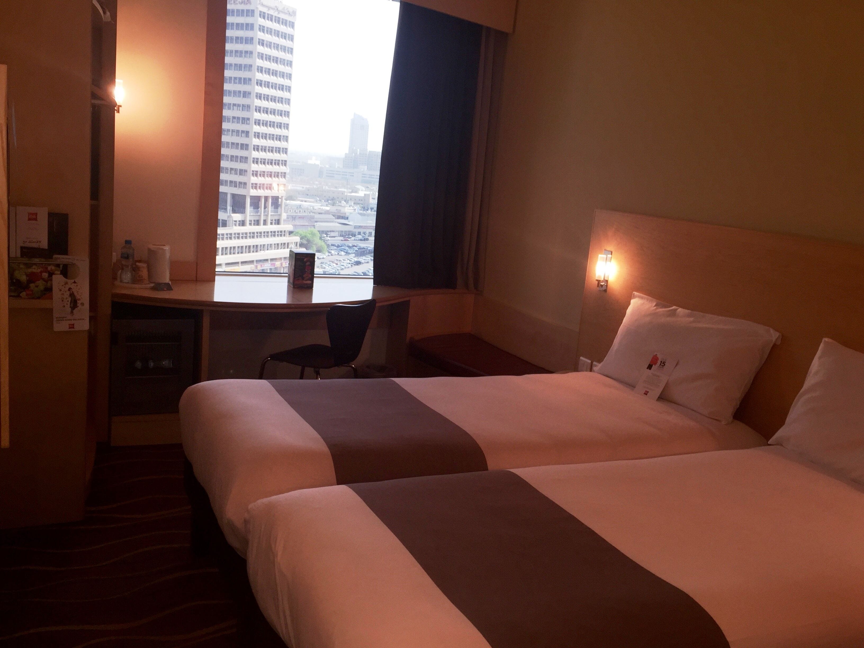 standard room, 2 single beds | in-room safe, desk, soundproofing, iron/ironing board