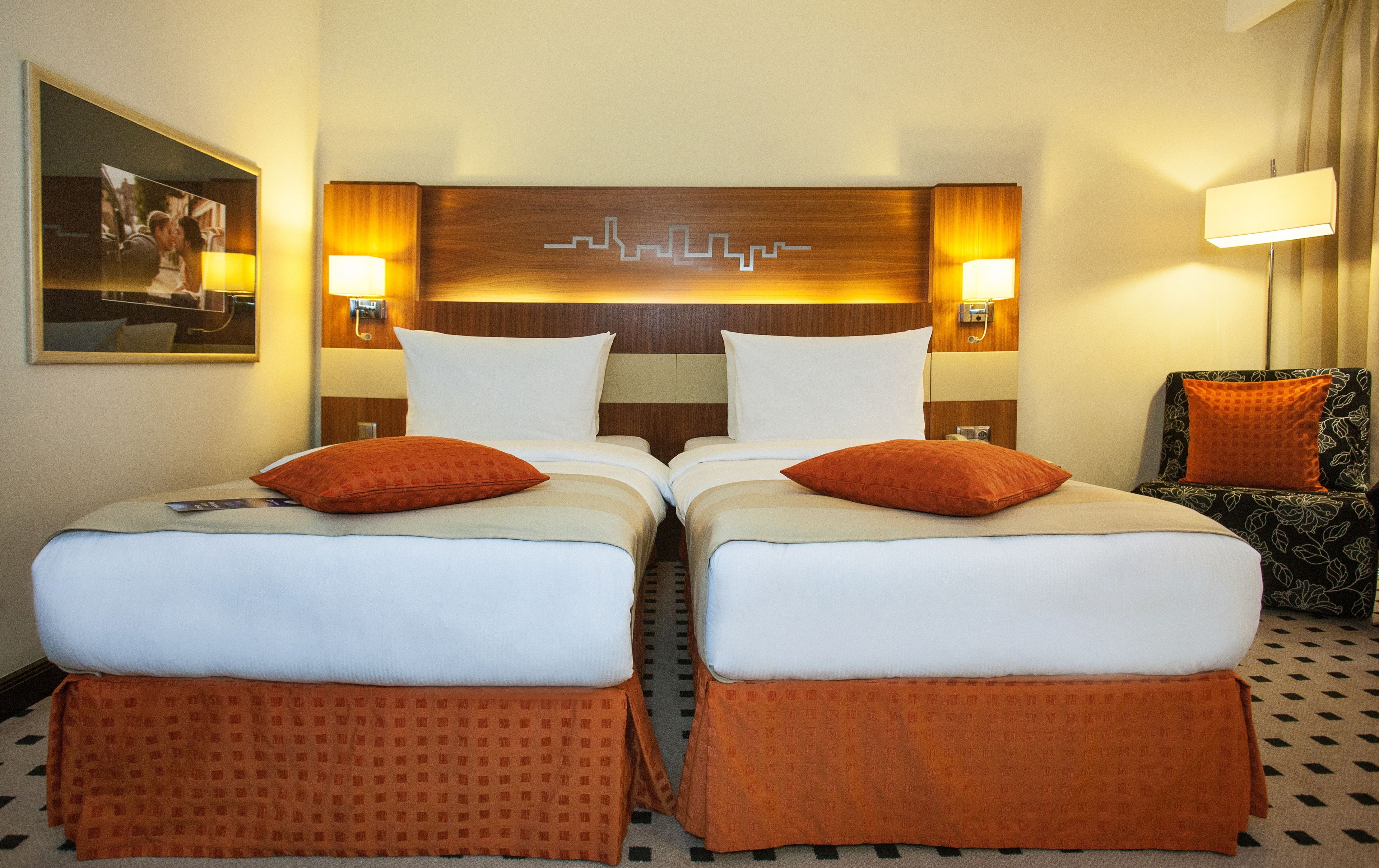 Premium bedding, down comforters, minibar, in-room safe