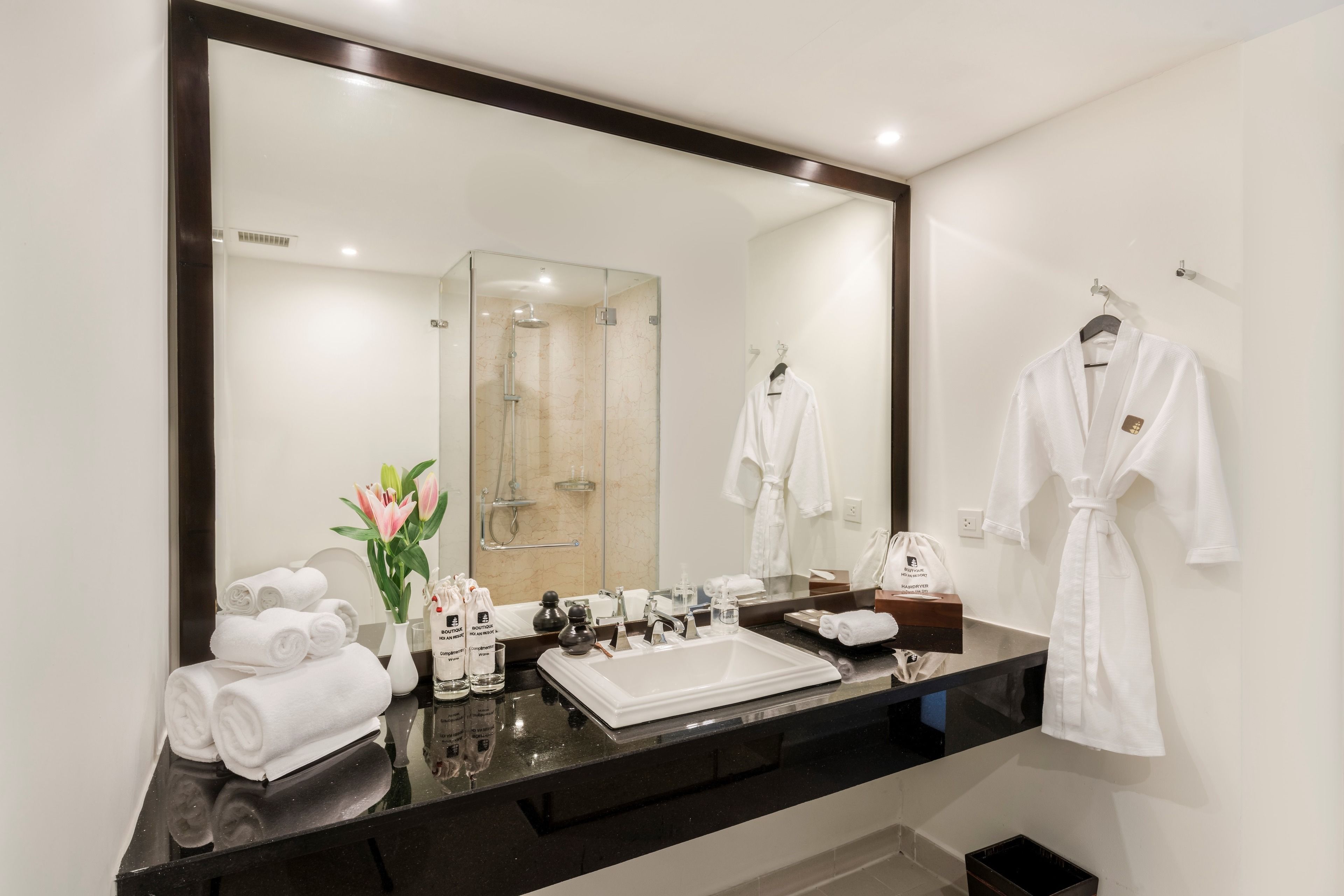superior room | bathroom | designer toiletries, hair dryer, bathrobes, slippers