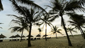 Private beach, white sand, sun-loungers, beach umbrellas