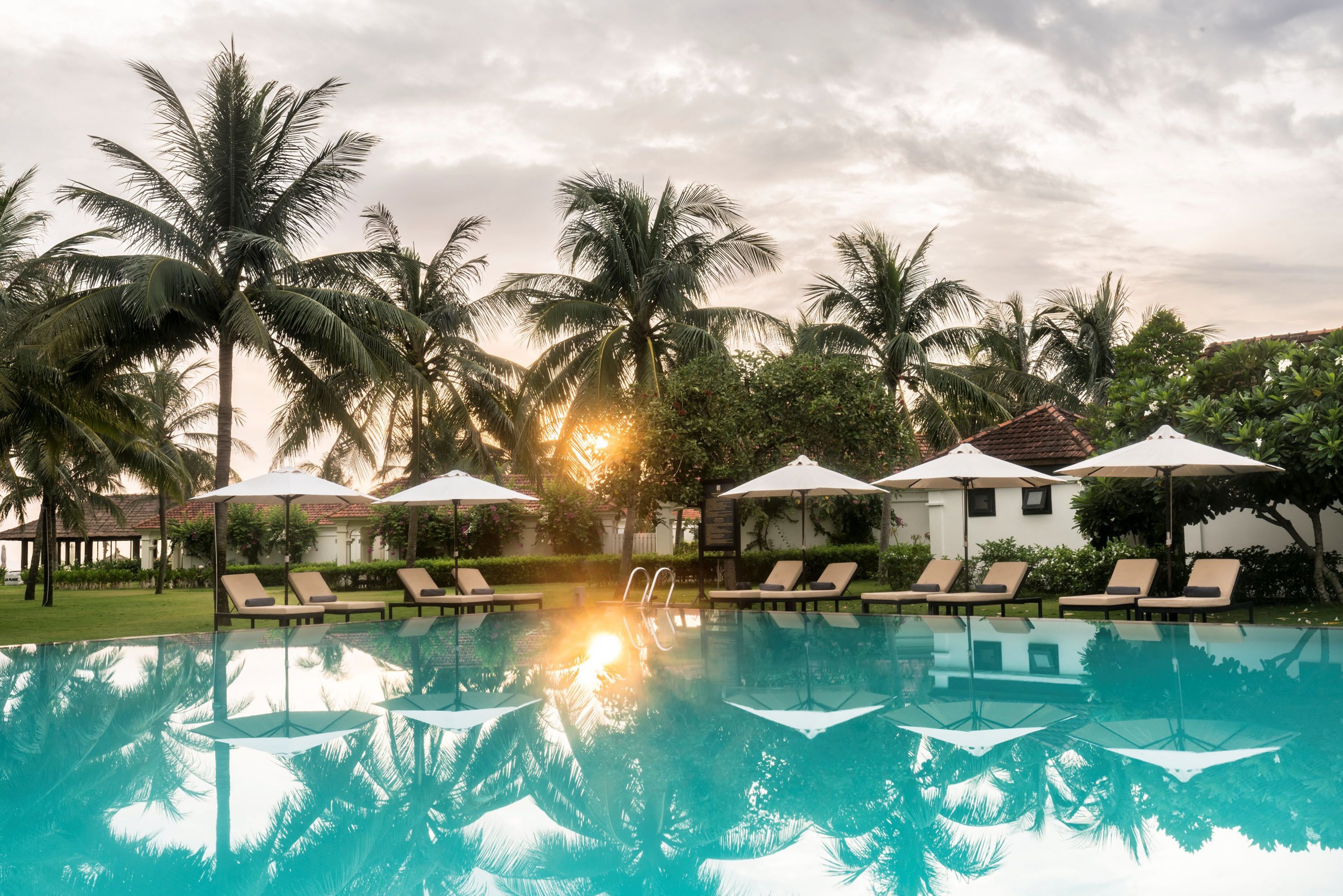 outdoor pool, pool umbrellas, pool loungers