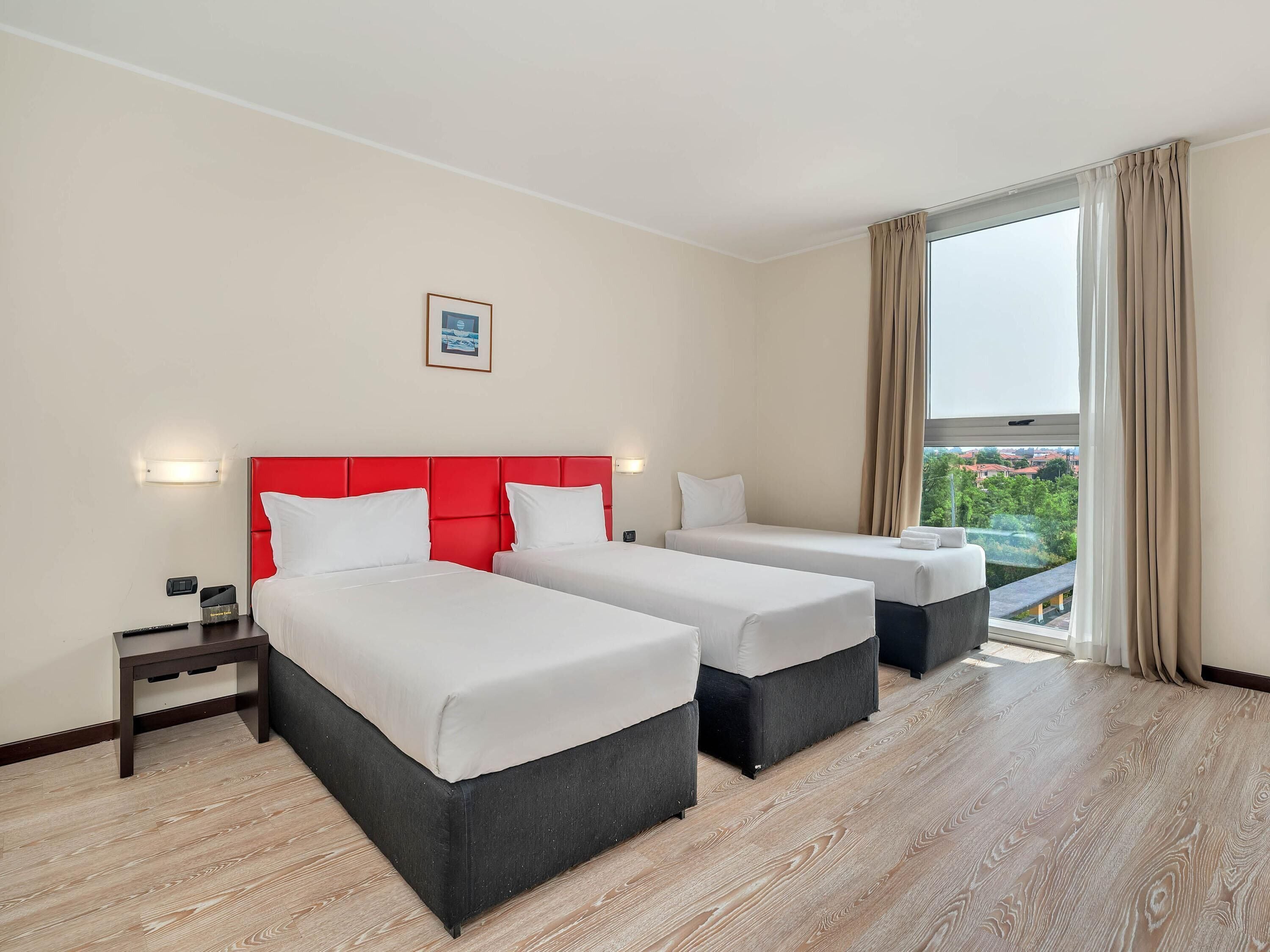 Superior Triple Room | Premium bedding, in-room safe, desk, blackout curtains