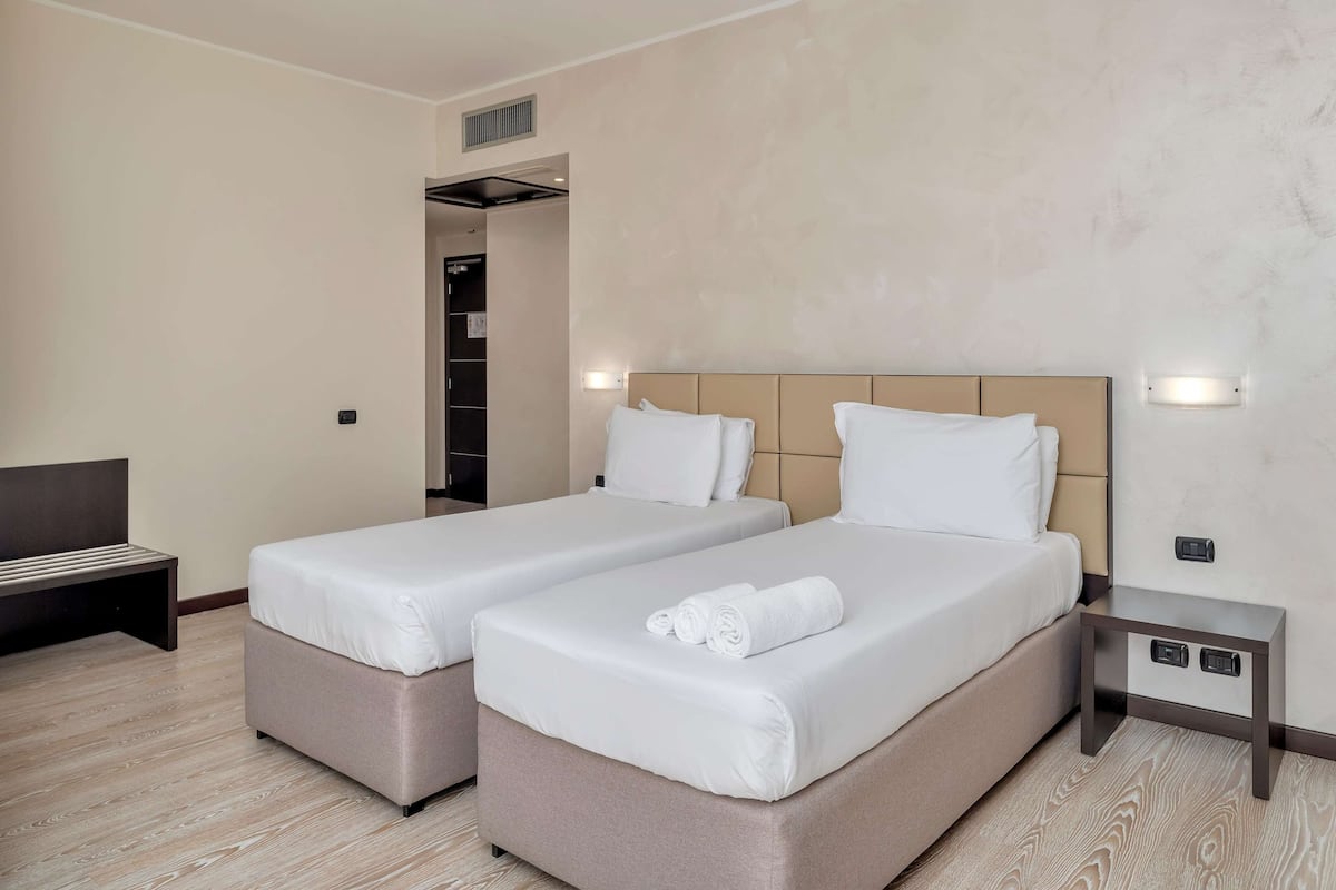 Biancheria da letto di alta qualità, una cassaforte in camera