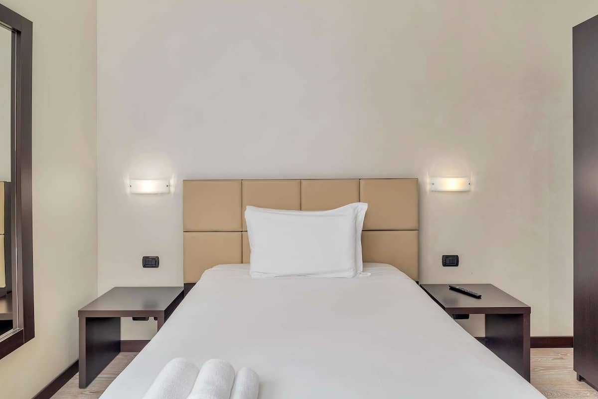 Biancheria da letto di alta qualità, una cassaforte in camera