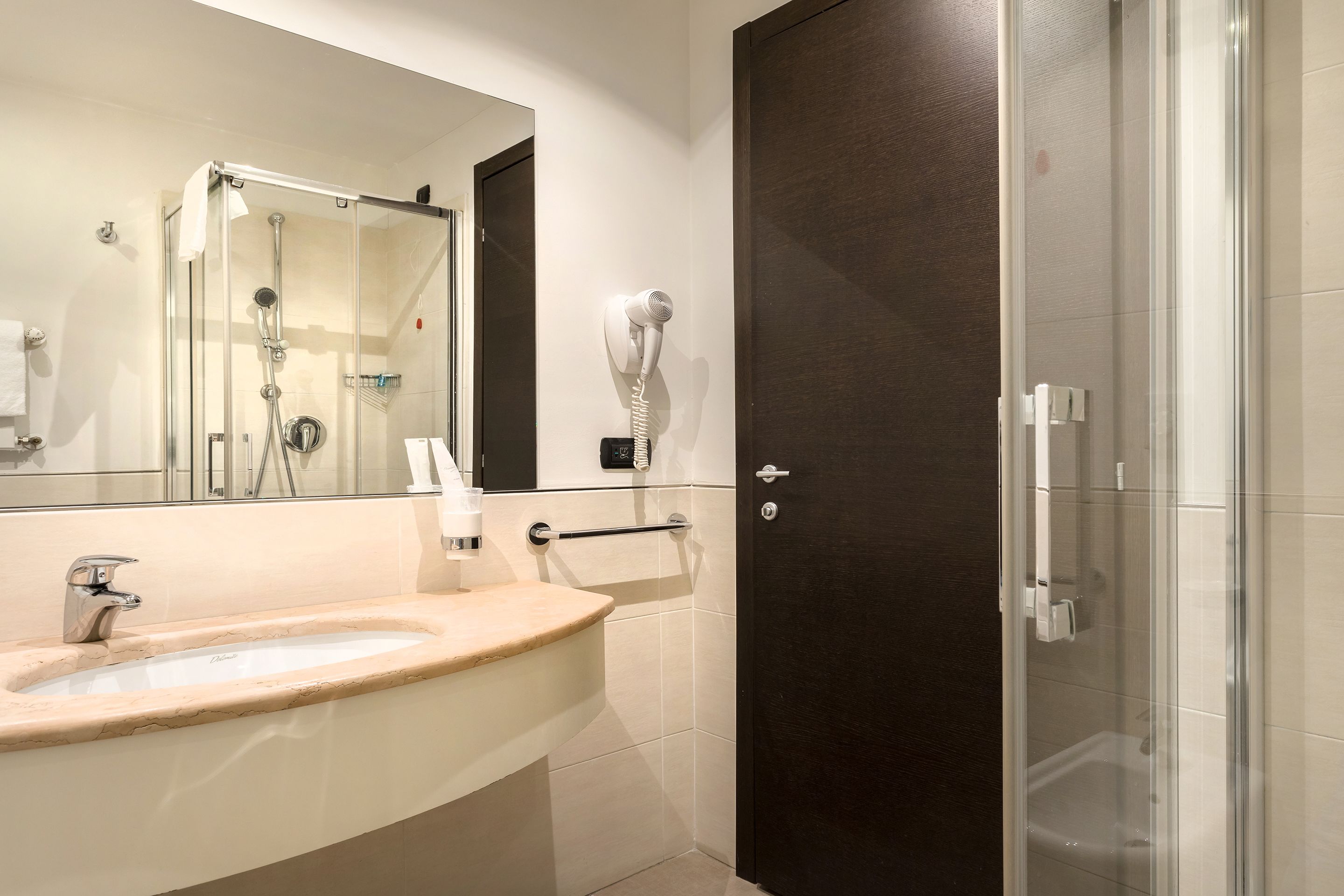 hair dryer, bidet, towels, soap