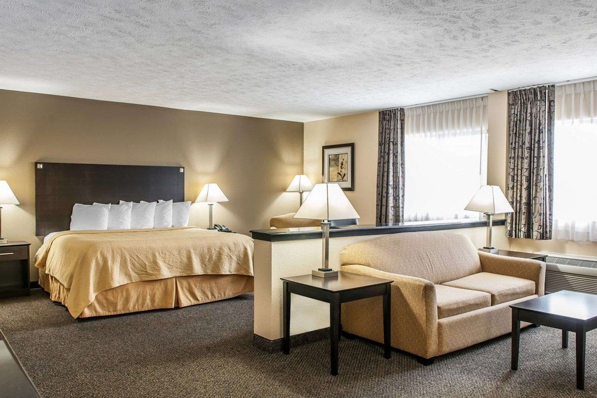 individually decorated, desk, laptop workspace, blackout curtains