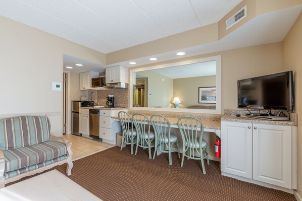 One Bedroom Suite with Living Room | Living area | Flat-screen TV, DVD player - Wild Dunes Inn (Ocean City)