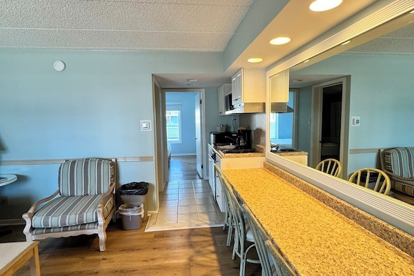 Suíte | Área de estar | TV de tela plana, DVD player