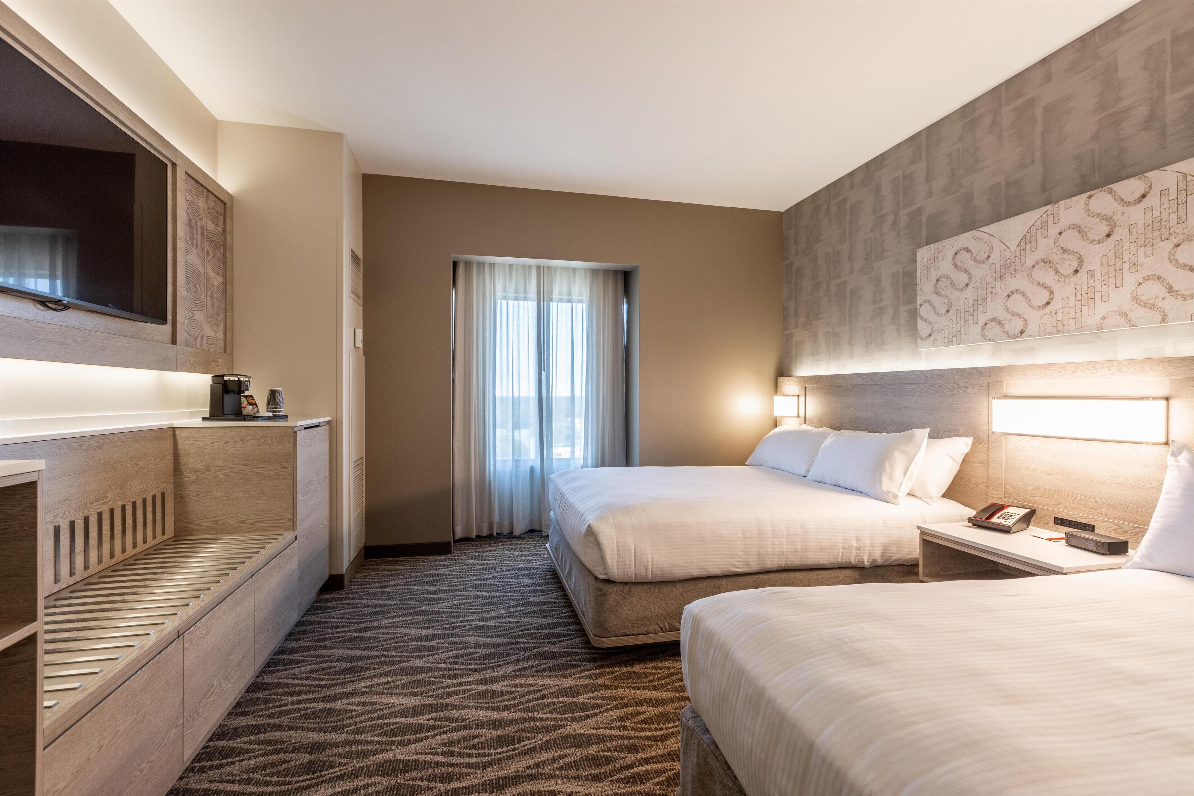 Premium bedding, pillowtop beds, in-room safe, individually furnished