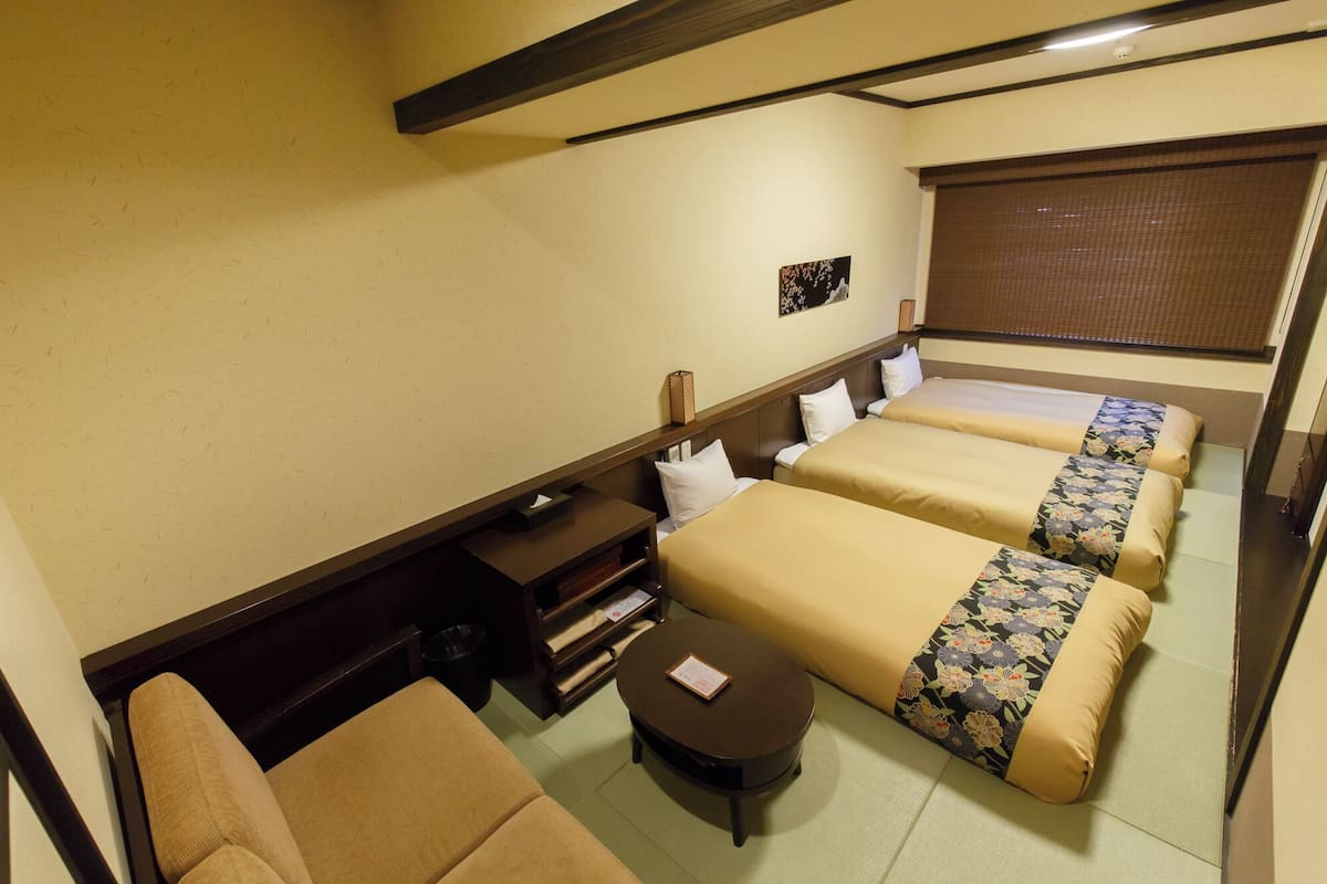 Japanese-Western Style Triple Room | In-room safe, desk, blackout drapes, iron/ironing board