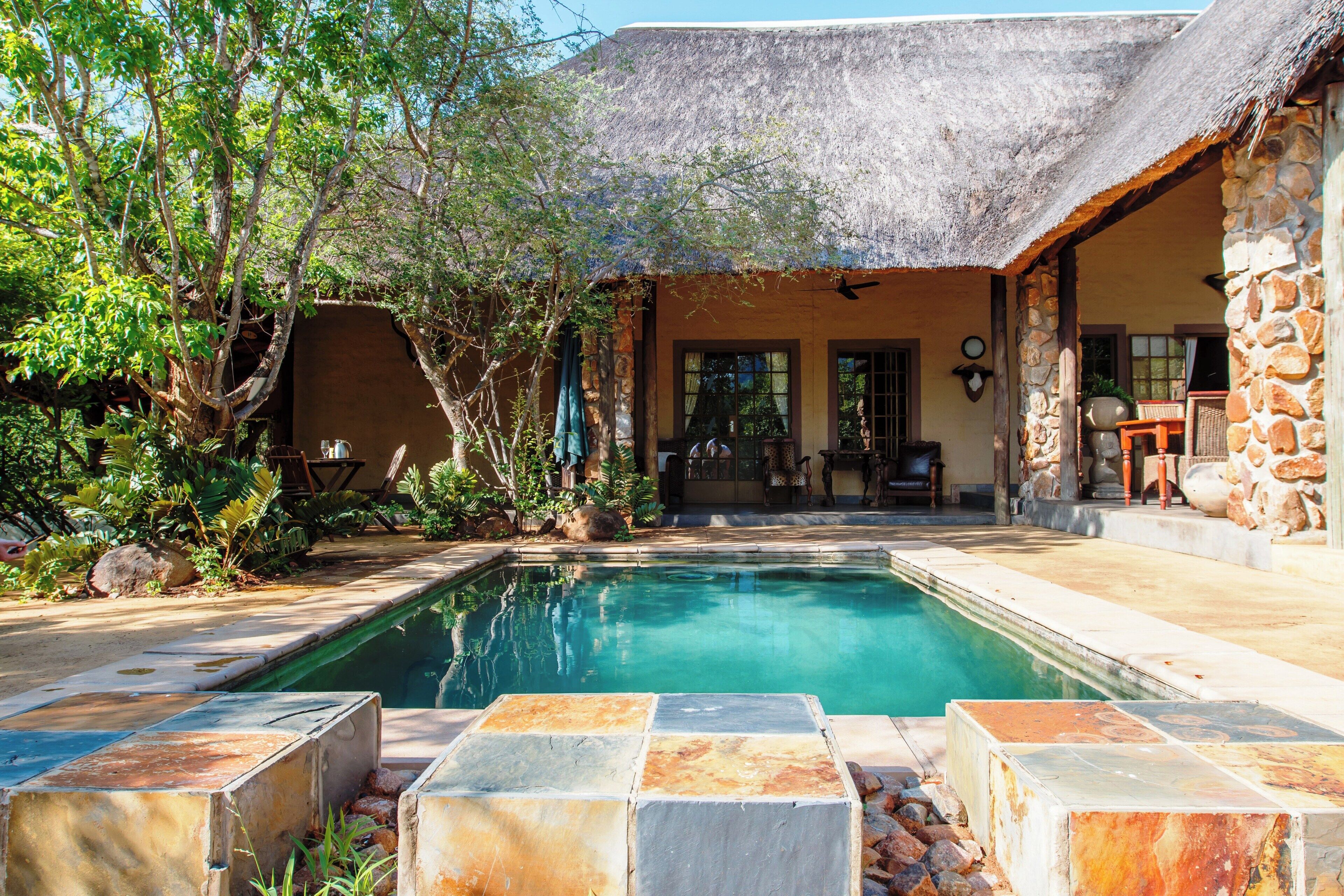 Outdoor pool, open 6:00 AM to 6:00 PM, pool umbrellas, sun loungers