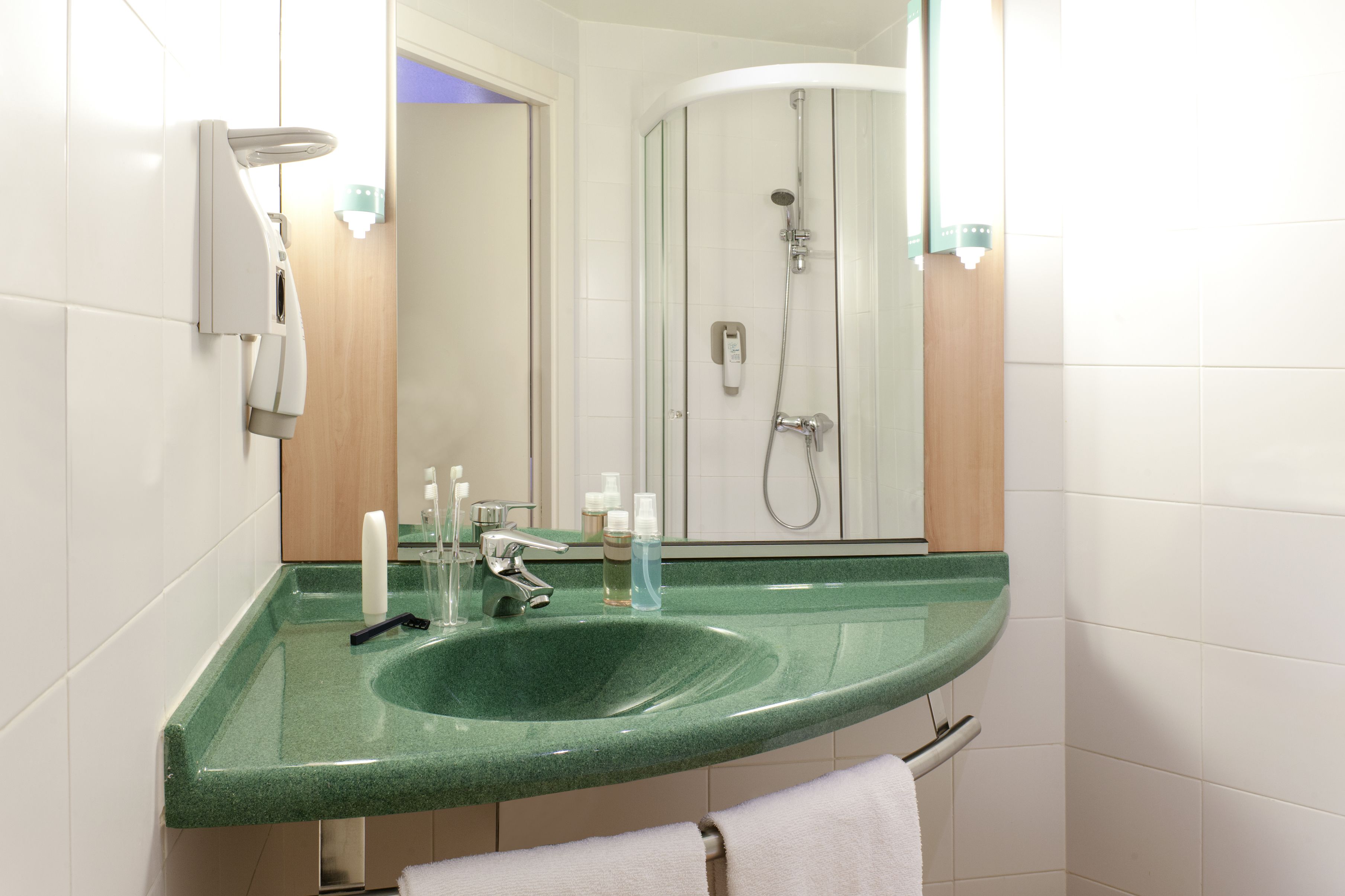 shower, eco-friendly toiletries, hair dryer, towels