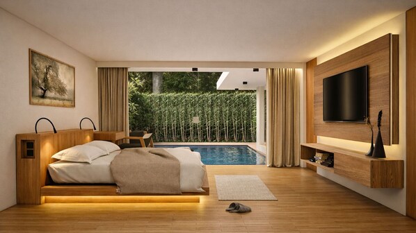 Un dormitorio moderno con cama, televisor, piscina y vistas a la vegetación.