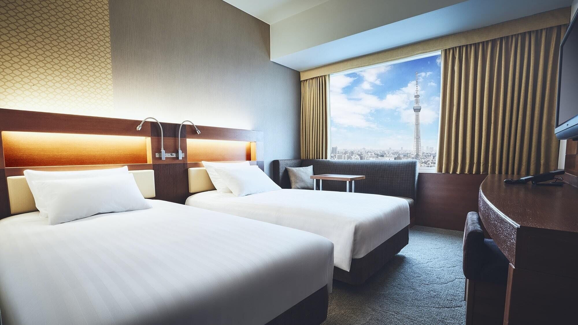 Seprai premium, selimut bulu angsa, dan tempat tidur Select Comfort