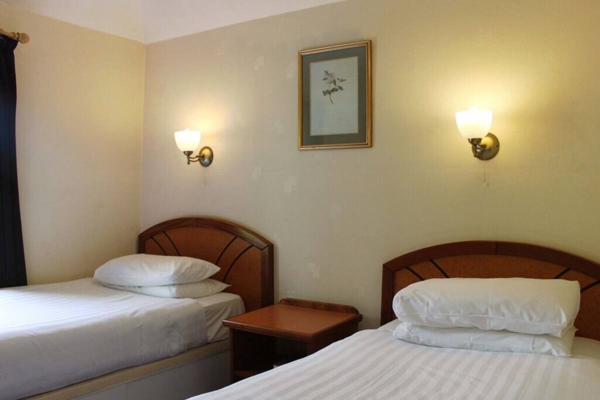 Chambre Standard avec lits jumeaux, salle de bains attenante