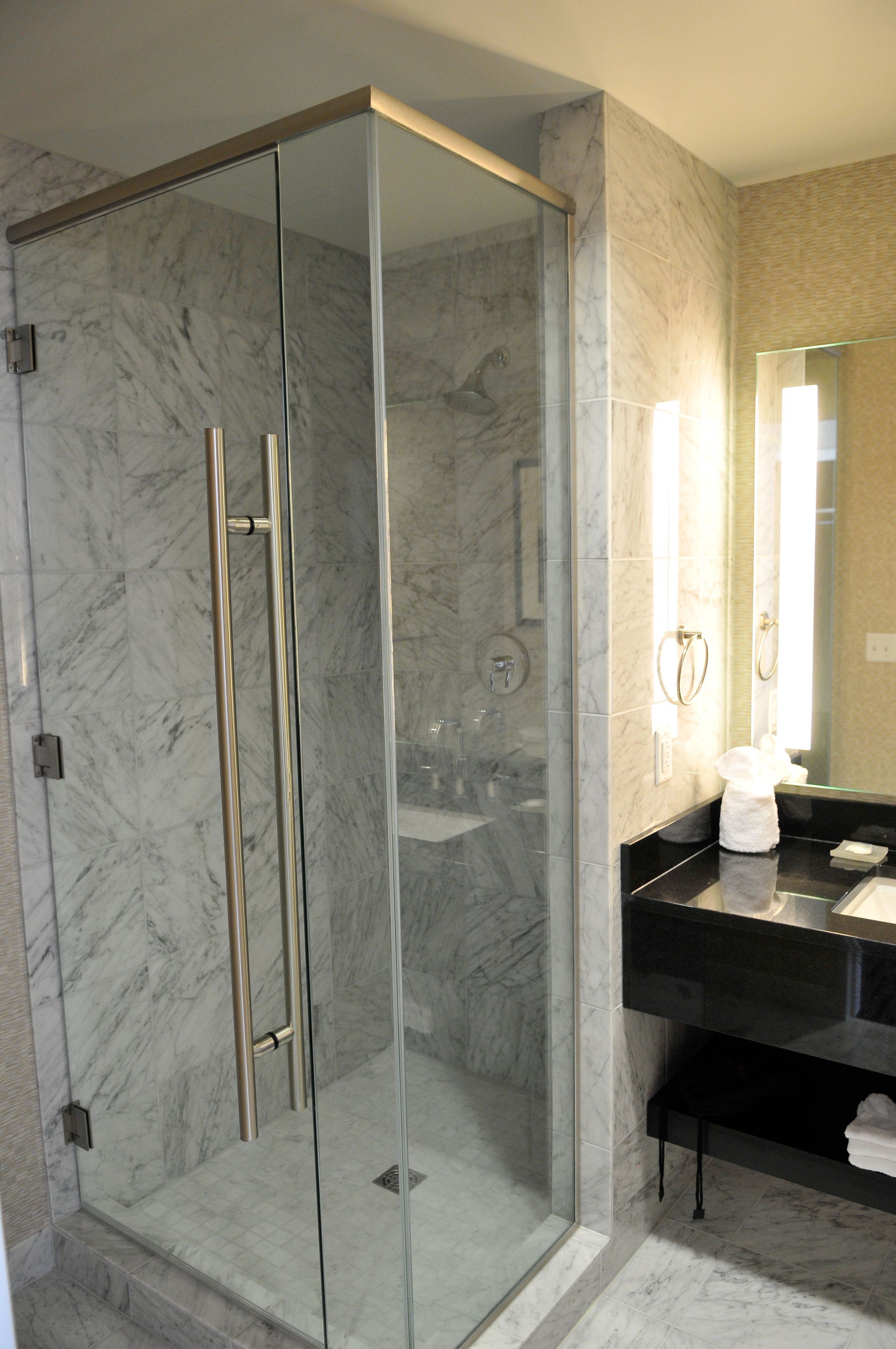 standard room, 2 queen beds | bathroom | shower, designer toiletries, hair dryer, bathrobes