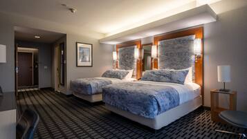 Hypo-allergenic bedding, down comforters, pillowtop beds, in-room safe