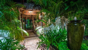 A pathway leading to a spa area with a sign reading "XAN Spa". - Sailing Club Resort Mui Ne (Mui Ne)