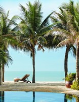 On the beach, sun-loungers, beach umbrellas