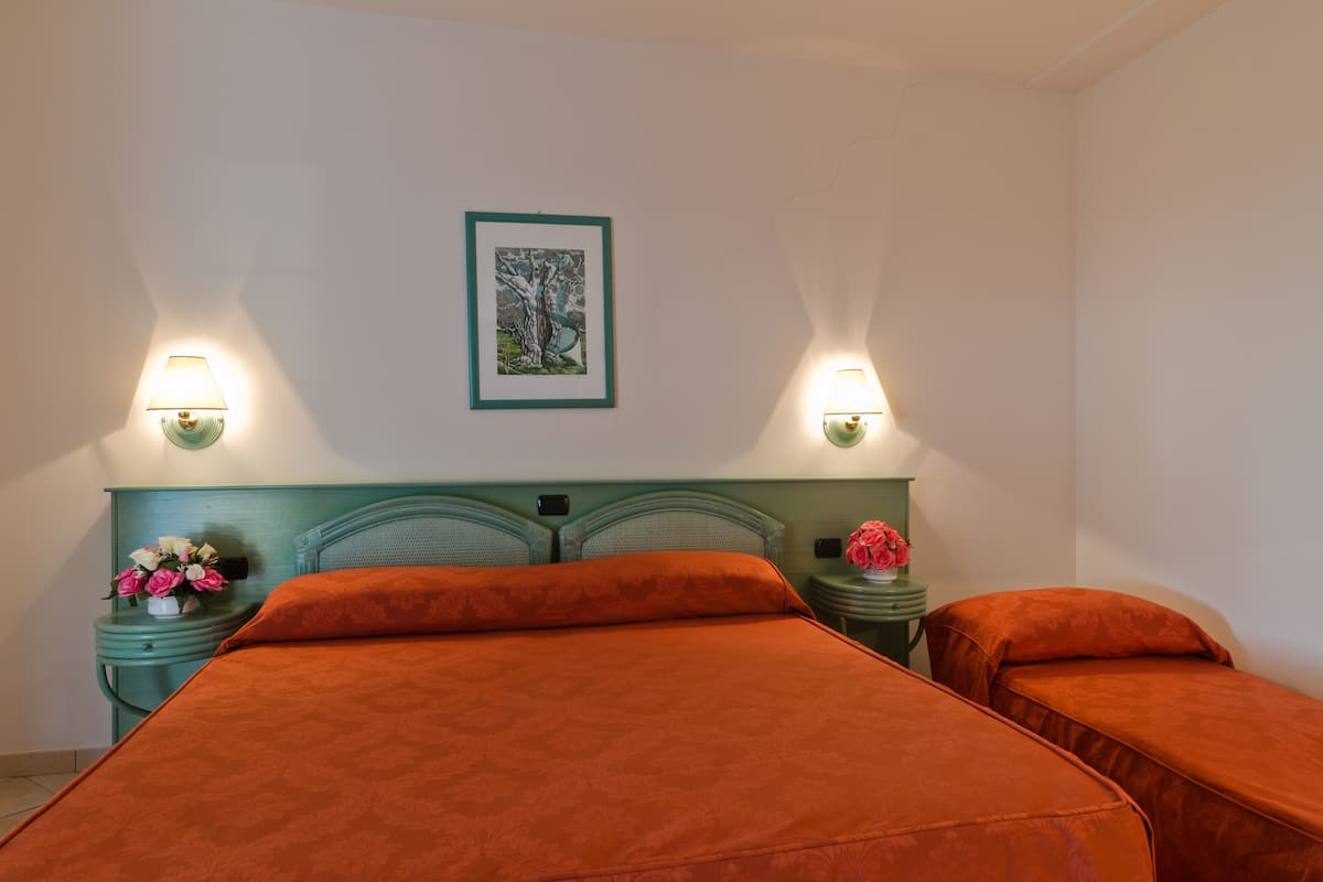 Triple Room, Pool Access | Premium bedding, desk, bed sheets, wheelchair access