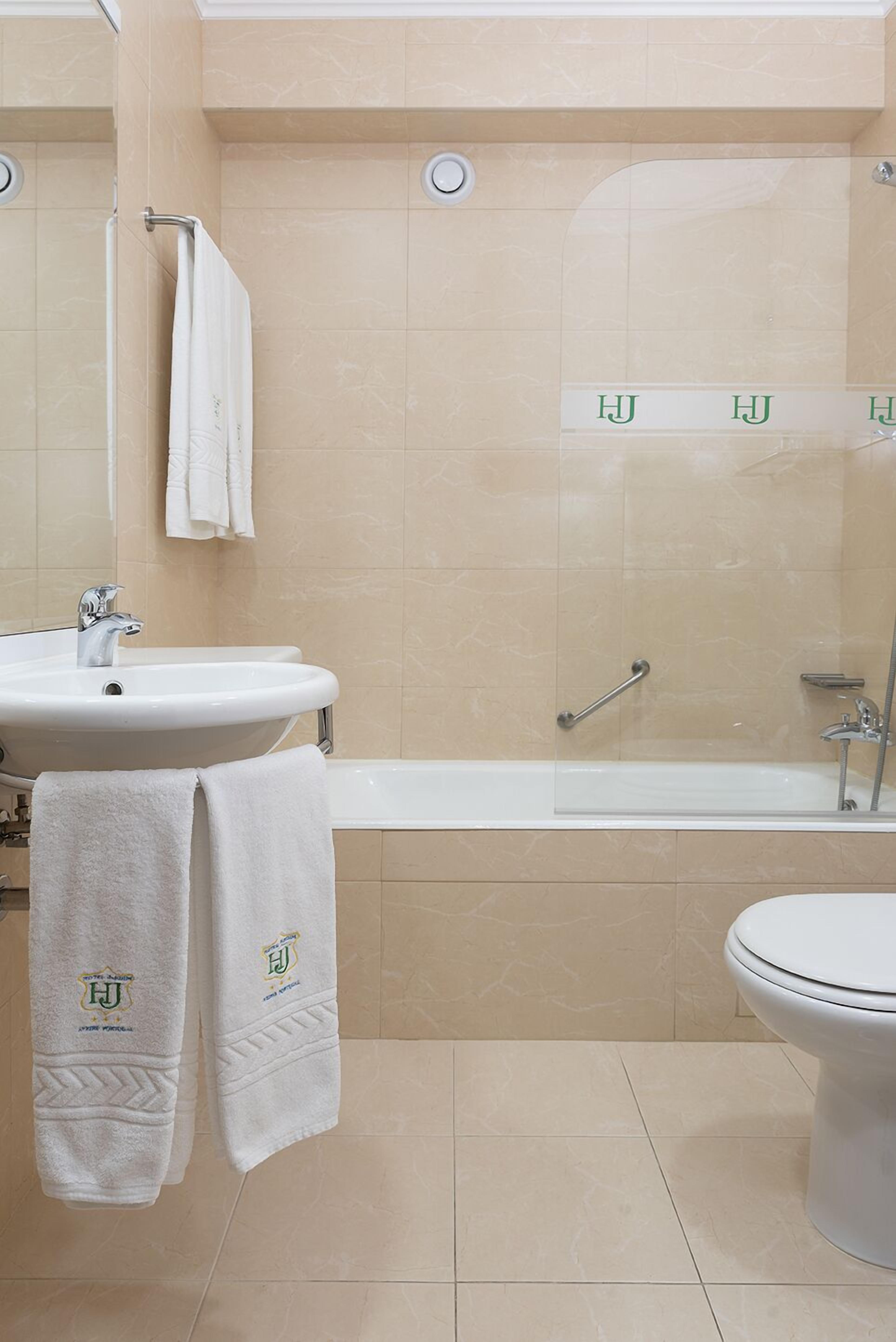 double room single use | bathroom | bathtub, free toiletries, hair dryer, towels