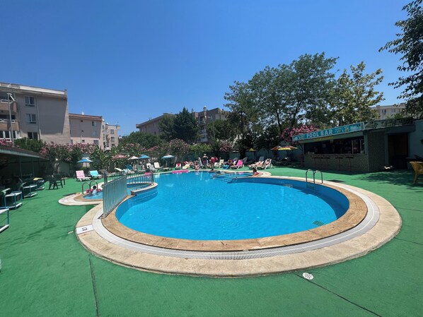 Seasonal outdoor pool, open 8:30 AM to 7:30 PM, pool umbrellas