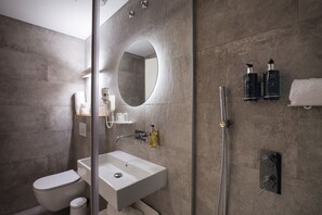 Shower, free toiletries, hair dryer, towels