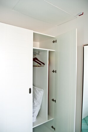 Premium bedding, down comforters, minibar, in-room safe