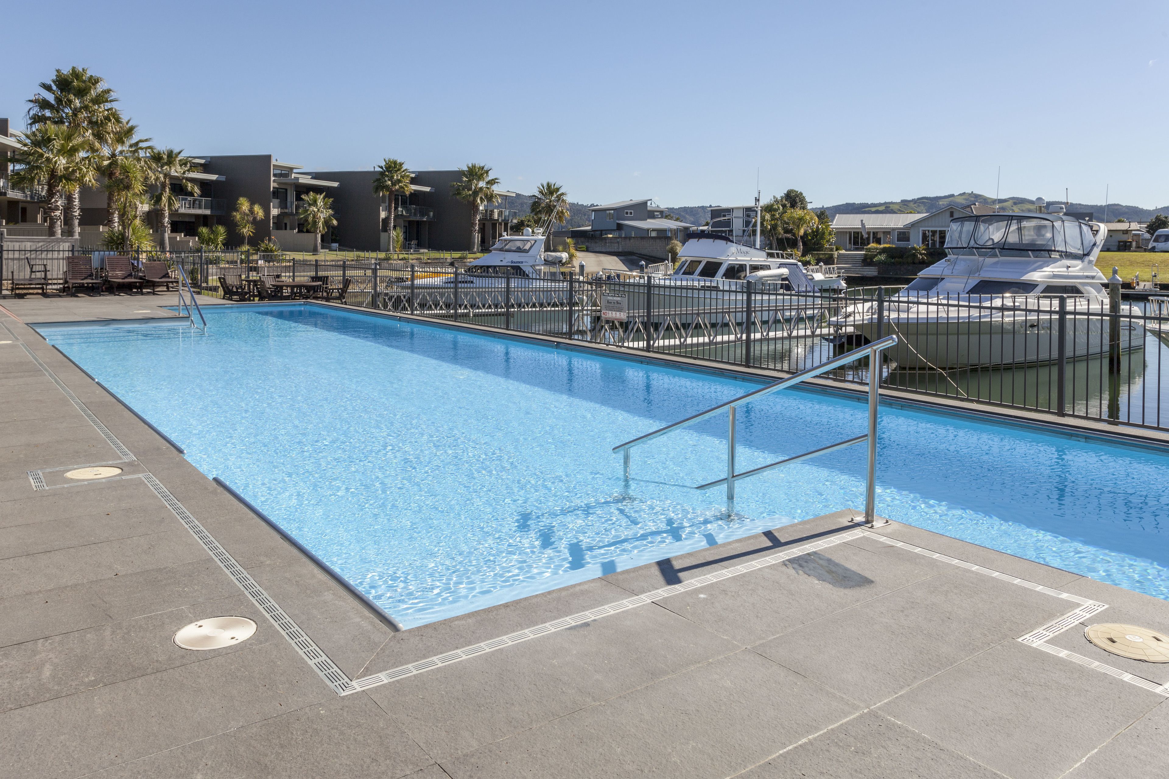 Seasonal outdoor pool, open 8 AM to 9 PM, pool umbrellas, sun loungers