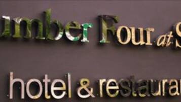 A sign for Number Four Stow hotel and restaurant.