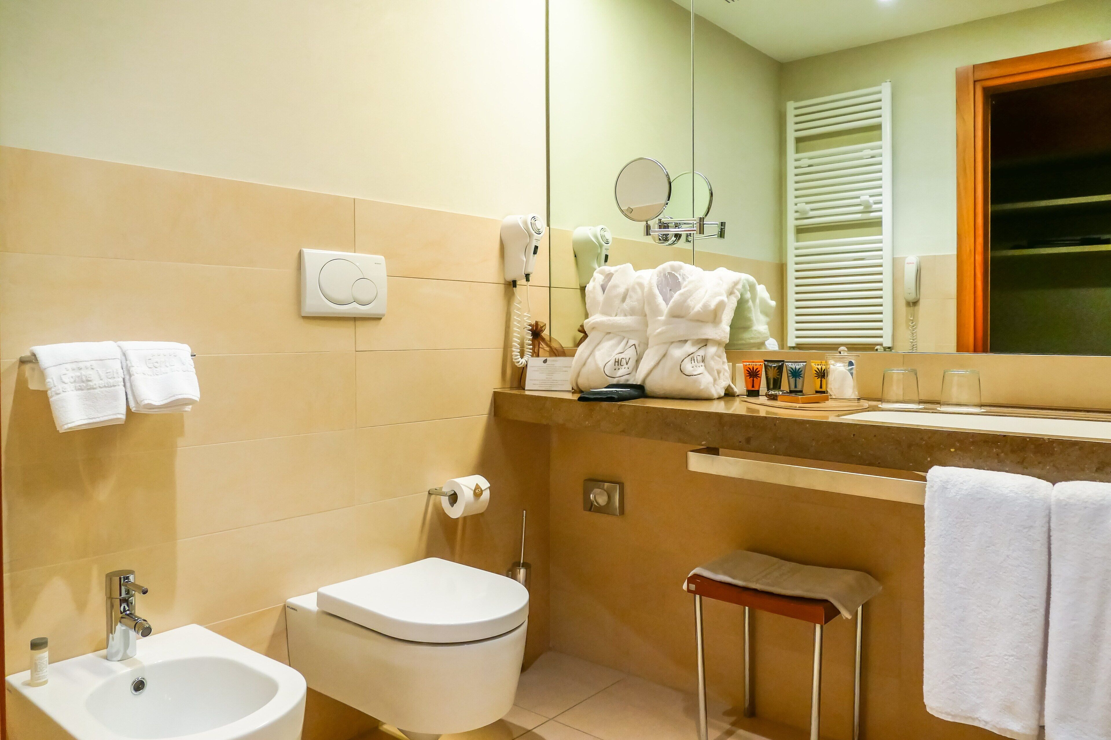 free toiletries, hair dryer, bathrobes, slippers