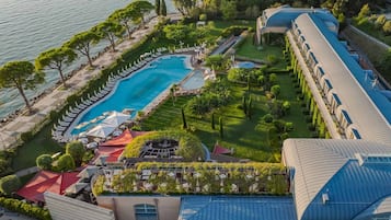 Indoor pool, outdoor pool, pool umbrellas, sun loungers