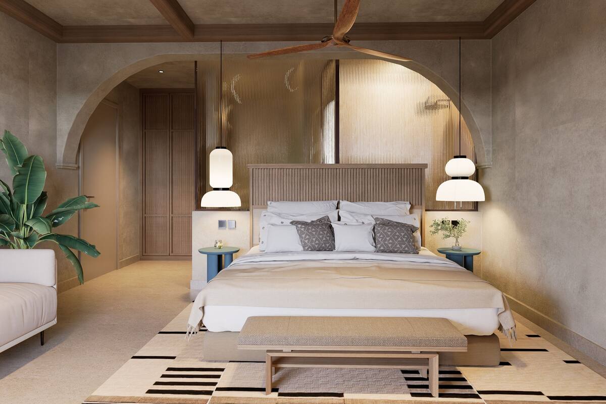 A modern bedroom with a large bed, two bedside tables, a ceiling fan, and a large window with blinds.
