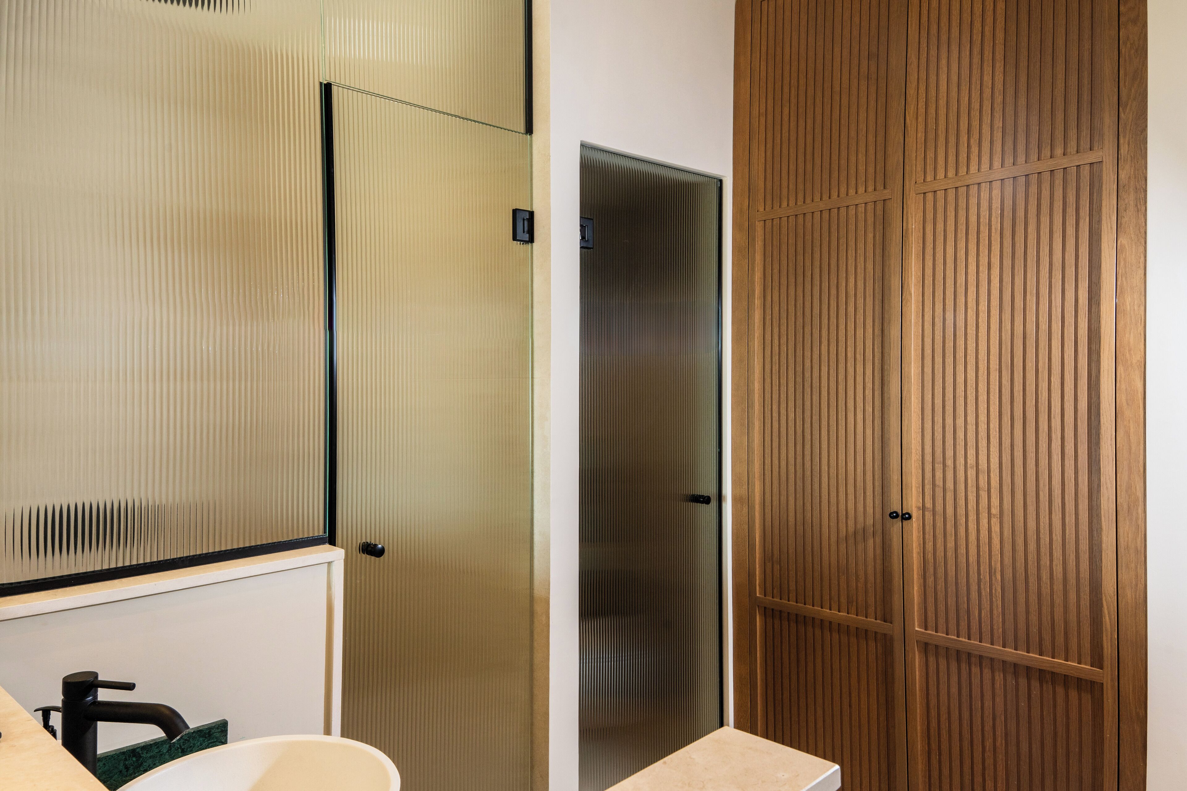 shower, rainfall showerhead, hair dryer, towels