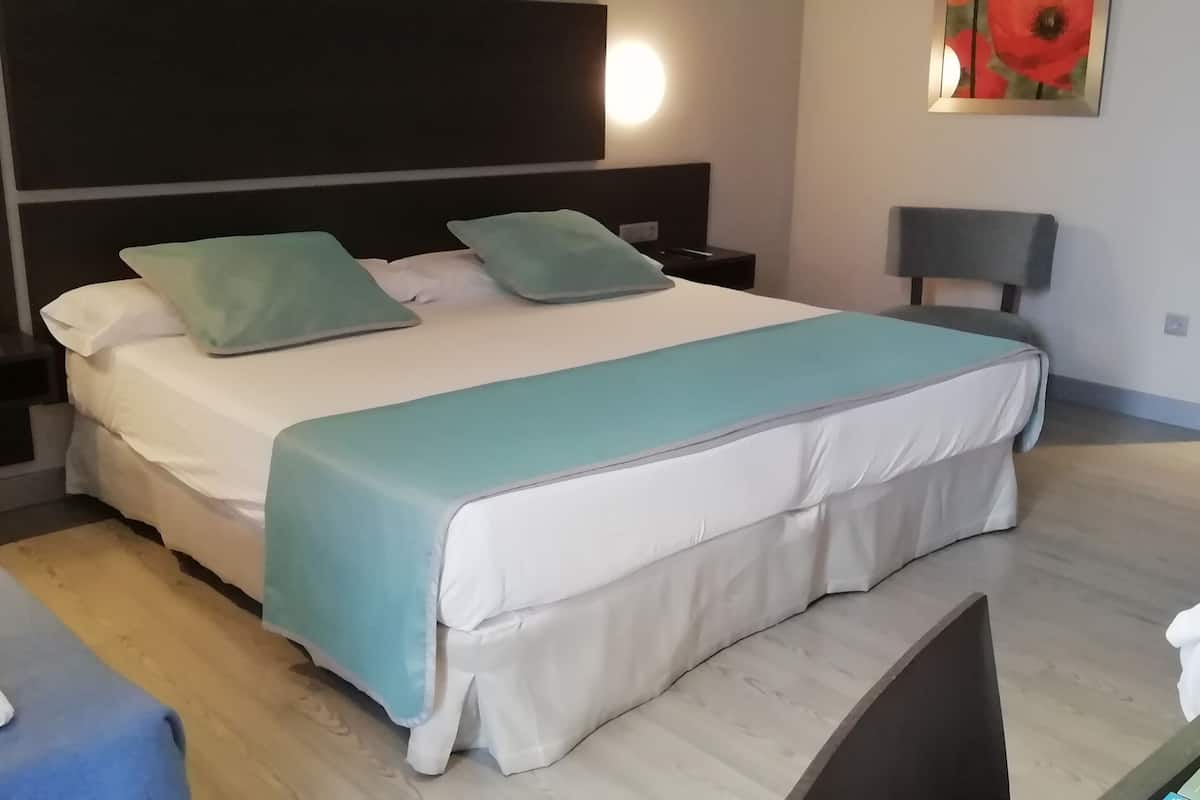 quadruple room | 1 bedroom, premium bedding, minibar, in-room safe