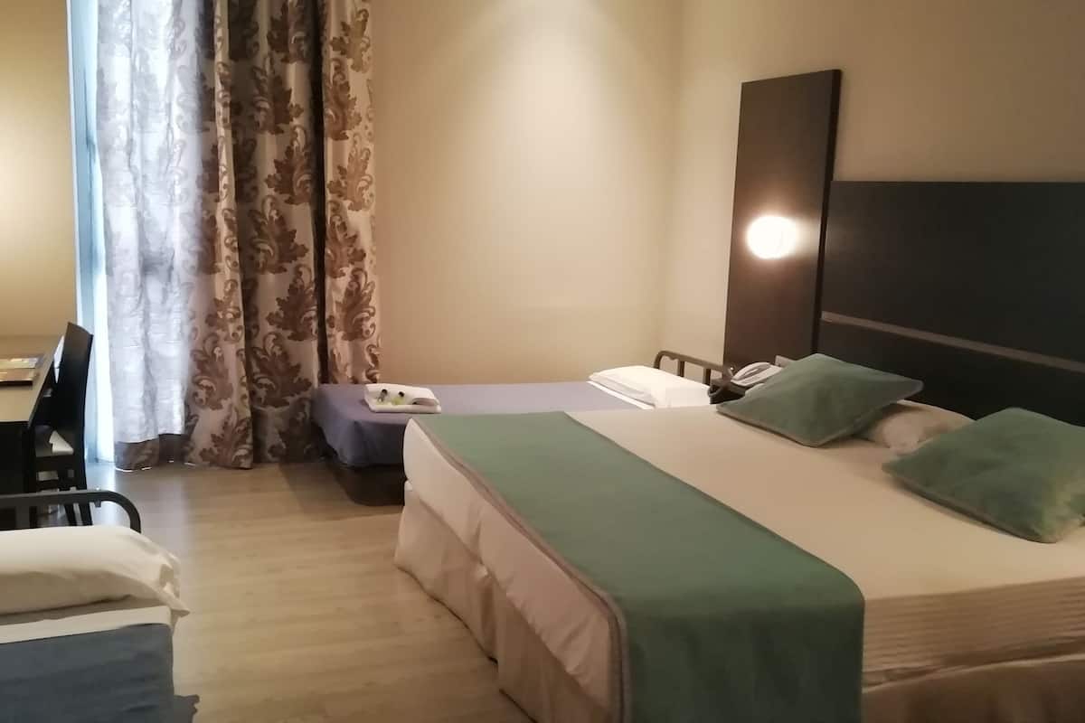 quadruple room | 1 bedroom, premium bedding, minibar, in-room safe